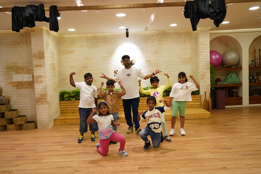 Children posing together inside Satria Studio